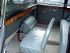 Inside view of rear seats with extra seat