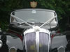 View of front of car showing Daimler badge