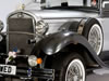 Close-up view of front and side of car