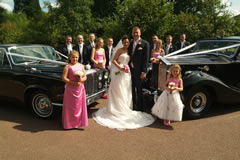 Wedding party with car